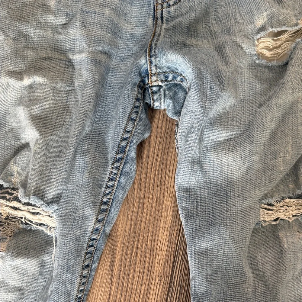 Levi's Light Blue Straight Jeans with Distressed Details
